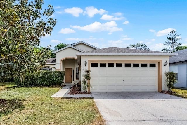 11460 Brown Quail Ct, Orlando, FL 32817 - ranch-style house featuring driveway, stucco siding, an attached garage, and a front lawn