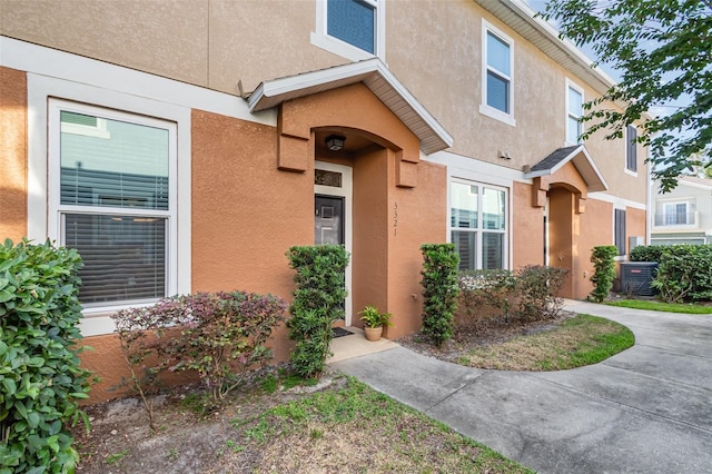 3321 San Jacinto Cir Unit 116, Sanford, FL 32771 - doorway to property with stucco siding