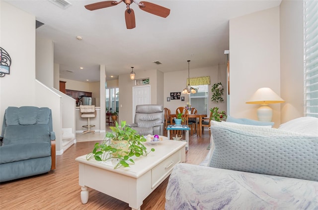 3321 San Jacinto Cir Unit 116, Sanford, FL 32771 - living area with plenty of natural light, light wood-style floors, a ceiling fan, recessed lighting, and baseboards