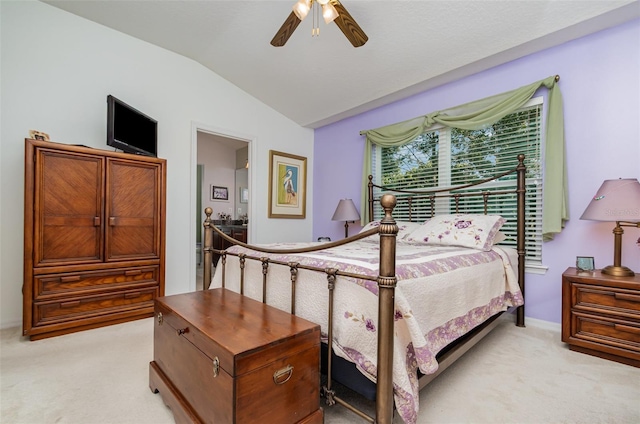3321 San Jacinto Cir Unit 116, Sanford, FL 32771 - bedroom with light colored carpet, vaulted ceiling, a ceiling fan, and baseboards