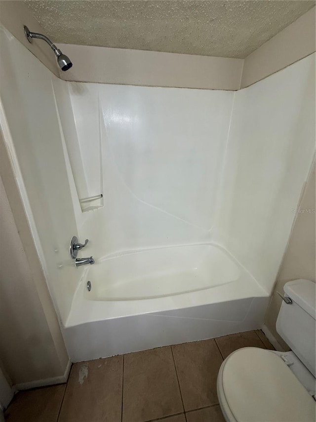 128 Water Front Way Unit 300, Altamonte Springs, FL 32701 - full bath with tub / shower combination, a textured ceiling, tile patterned floors, and toilet