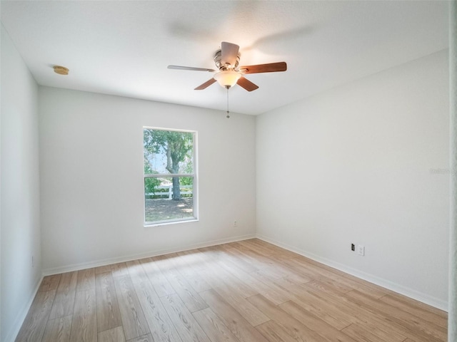 2907 Southern Pines Loop, Clermont, FL 34711 - empty room featuring light wood finished floors, baseboards, and ceiling fan