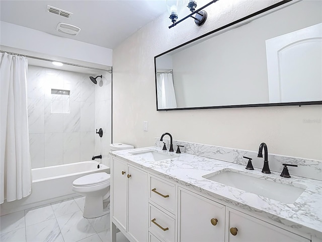 21940 Dupree Dr, Land O Lakes, FL 34639 - full bath with a sink, toilet, double vanity, and marble finish floor