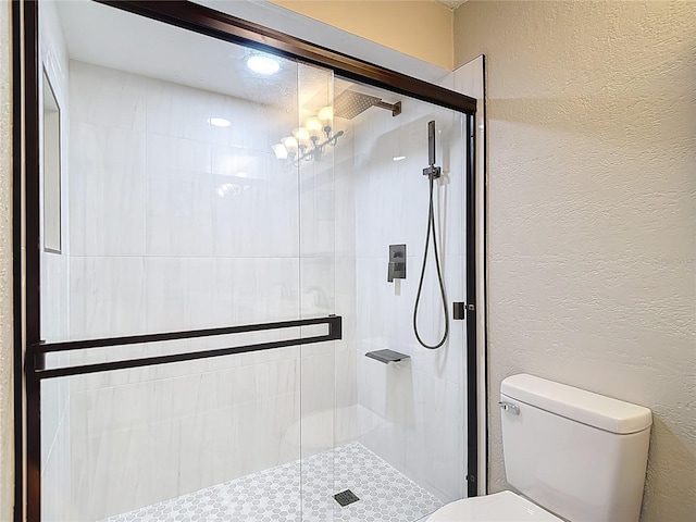 21940 Dupree Dr, Land O Lakes, FL 34639 - full bathroom featuring a textured wall, a stall shower, and toilet