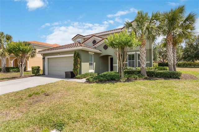 4201 Oakview Dr, Davenport, FL 33837 - mediterranean / spanish-style home with a front yard, stucco siding, a tiled roof, concrete driveway, and an attached garage