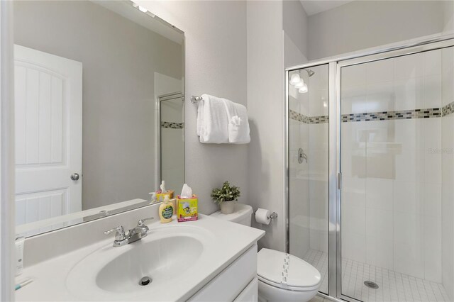 4201 Oakview Dr, Davenport, FL 33837 - full bath featuring vanity, a stall shower, and toilet