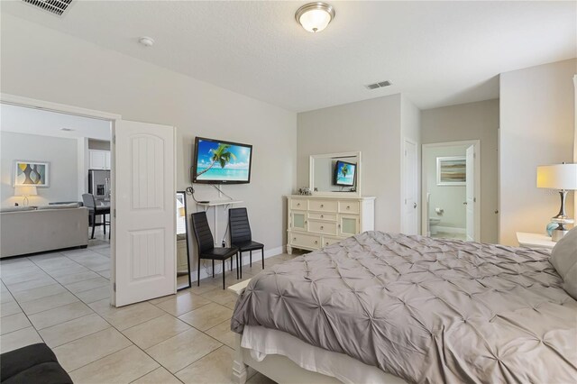 4201 Oakview Dr, Davenport, FL 33837 - bedroom with light tile patterned floors and visible vents