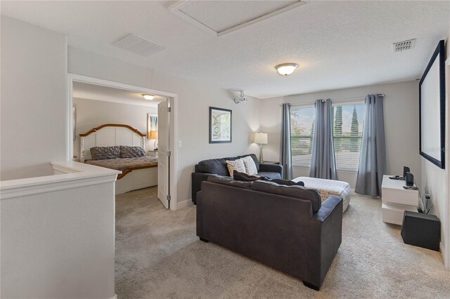 4201 Oakview Dr, Davenport, FL 33837 - bedroom with light carpet, attic access, and visible vents