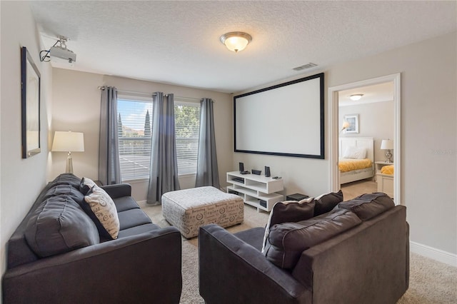 4201 Oakview Dr, Davenport, FL 33837 - carpeted cinema with baseboards, a textured ceiling, and visible vents