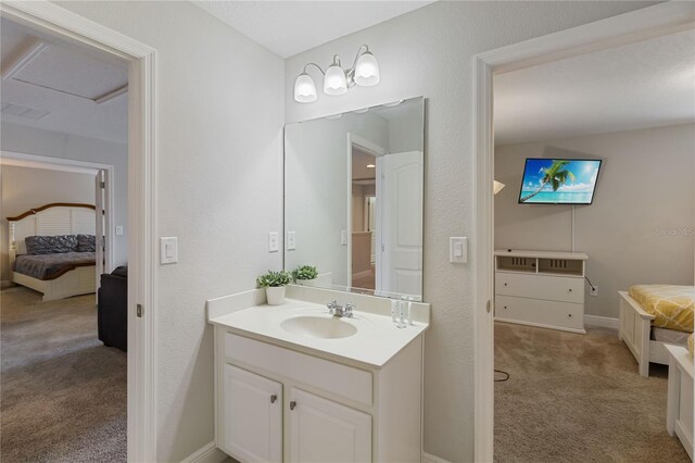 4201 Oakview Dr, Davenport, FL 33837 - ensuite bathroom with ensuite bathroom, baseboards, visible vents, and vanity