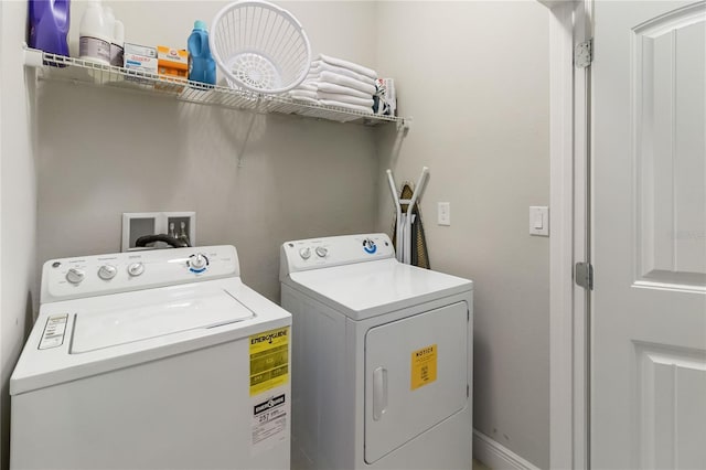4201 Oakview Dr, Davenport, FL 33837 - laundry area featuring separate washer and dryer and laundry area