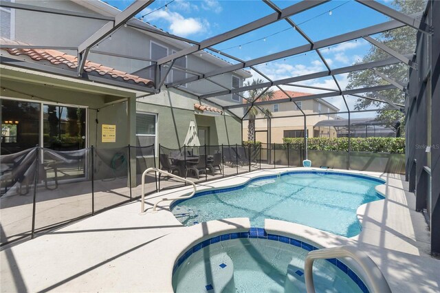 4201 Oakview Dr, Davenport, FL 33837 - view of pool featuring a pool with connected hot tub and a patio area