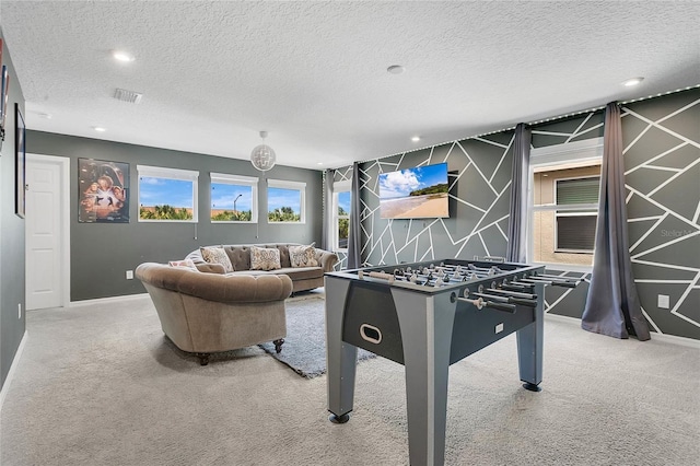 8951 Amelia Downs Trl, Kissimmee, FL 34747 - game room with carpet, a textured ceiling, and recessed lighting