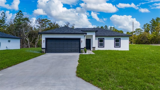 6257 SW 153 Rd Ln, Ocala, FL 34473 - prairie-style house featuring an attached garage, driveway, a front yard, and stucco siding