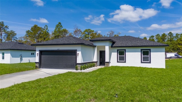 6257 SW 153 Rd Ln, Ocala, FL 34473 - prairie-style house with driveway, an attached garage, a front yard, stucco siding, and roof with shingles