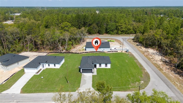 6257 SW 153 Rd Ln, Ocala, FL 34473 - birds eye view of property with a view of trees