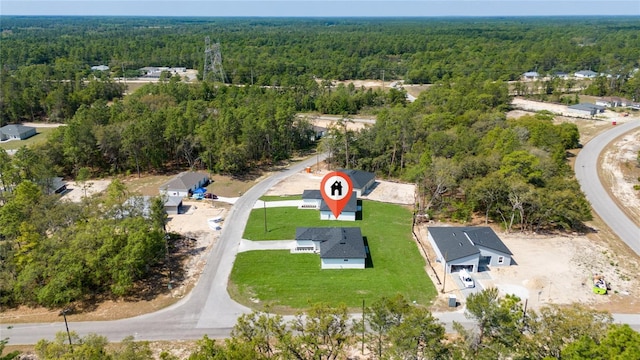 6257 SW 153 Rd Ln, Ocala, FL 34473 - drone / aerial view with a wooded view