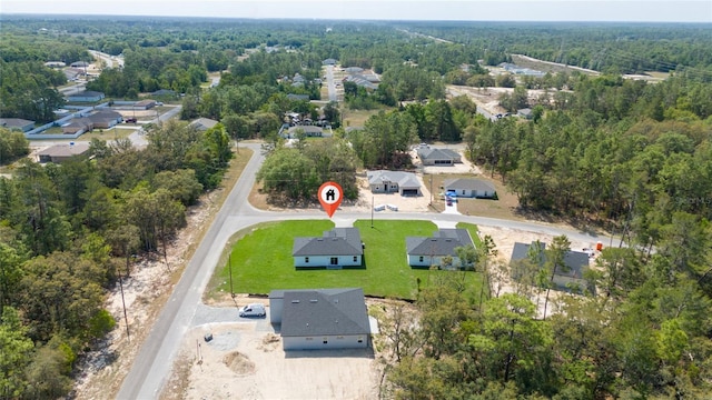 6257 SW 153 Rd Ln, Ocala, FL 34473 - birds eye view of property with a view of trees and a residential view