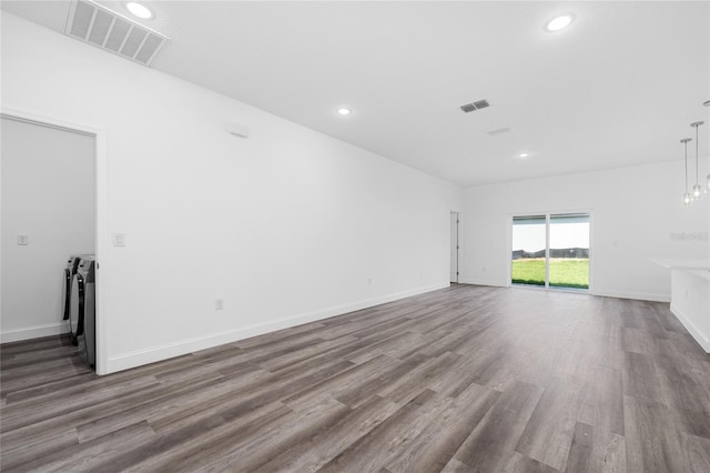6257 SW 153 Rd Ln, Ocala, FL 34473 - unfurnished living room featuring recessed lighting, visible vents, and separate washer and dryer