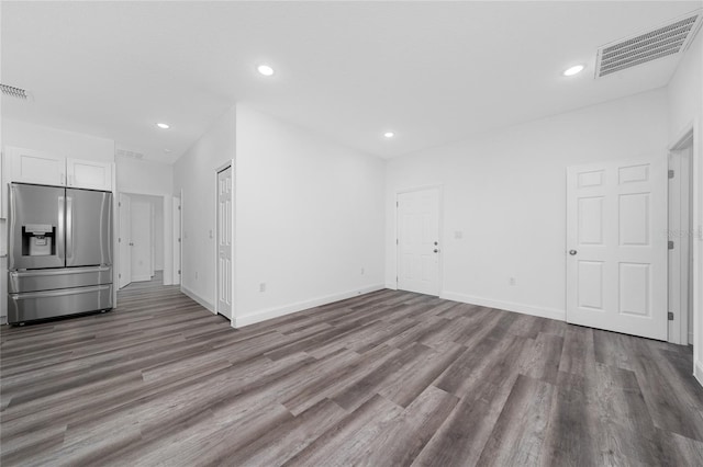 6257 SW 153 Rd Ln, Ocala, FL 34473 - unfurnished living room with recessed lighting, wood finished floors, visible vents, and baseboards