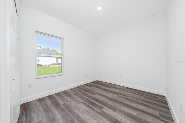 6257 SW 153 Rd Ln, Ocala, FL 34473 - unfurnished room featuring dark wood-type flooring, baseboards, and recessed lighting