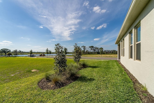 view of yard with a water view