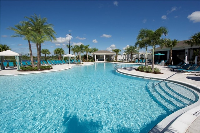pool with a patio
