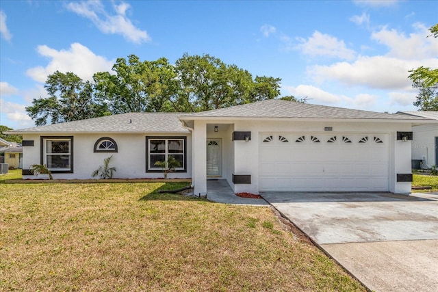 3111 Pine Tree Dr, Edgewater, FL 32141 - single story home featuring driveway, a front yard, an attached garage, a shingled roof, and stucco siding