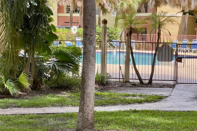 604 Kenwick Cir Unit 105, Casselberry, FL 32707 - community pool featuring fence