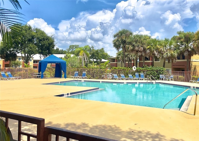 604 Kenwick Cir Unit 105, Casselberry, FL 32707 - pool featuring a gazebo, a patio, and fence