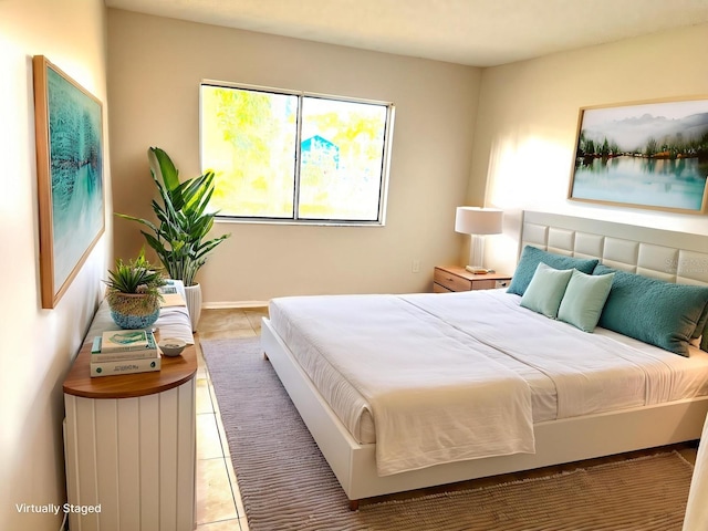 604 Kenwick Cir Unit 105, Casselberry, FL 32707 - bedroom featuring light tile patterned floors