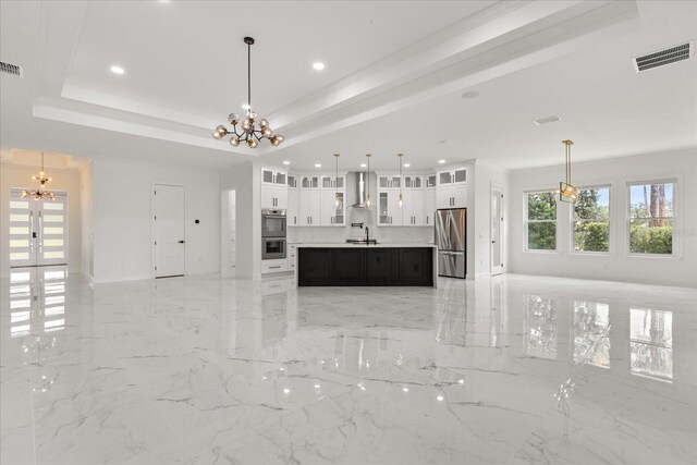 16500 Magnolia Terrace Blvd, Montverde, FL 34756 - unfurnished living room with a chandelier, a sink, light marble finish floors, baseboards, and recessed lighting