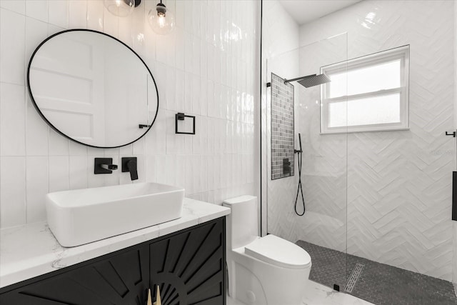16500 Magnolia Terrace Blvd, Montverde, FL 34756 - full bath with toilet, vanity, tile walls, a walk in shower, and marble look tile flooring