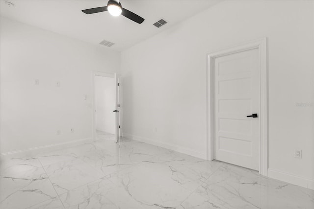 16500 Magnolia Terrace Blvd, Montverde, FL 34756 - spare room with light marble finish flooring, baseboards, and ceiling fan