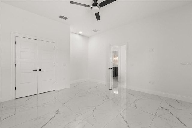 16500 Magnolia Terrace Blvd, Montverde, FL 34756 - empty room featuring light marble finish floors, a ceiling fan, baseboards, and recessed lighting
