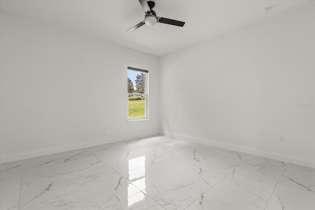 16500 Magnolia Terrace Blvd, Montverde, FL 34756 - spare room with baseboards, light marble finish flooring, ceiling fan, and a smoke detector