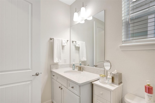 8044 Lost Shaker Ln, Kissimmee, FL 34747 - bathroom featuring vanity and toilet