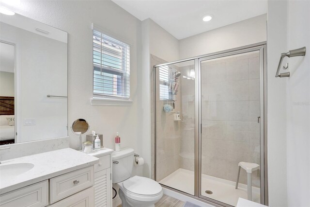 8044 Lost Shaker Ln, Kissimmee, FL 34747 - full bath with vanity, toilet, and a shower stall
