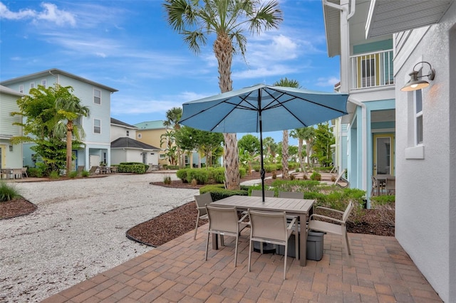 8044 Lost Shaker Ln, Kissimmee, FL 34747 - view of patio / terrace with outdoor dining space