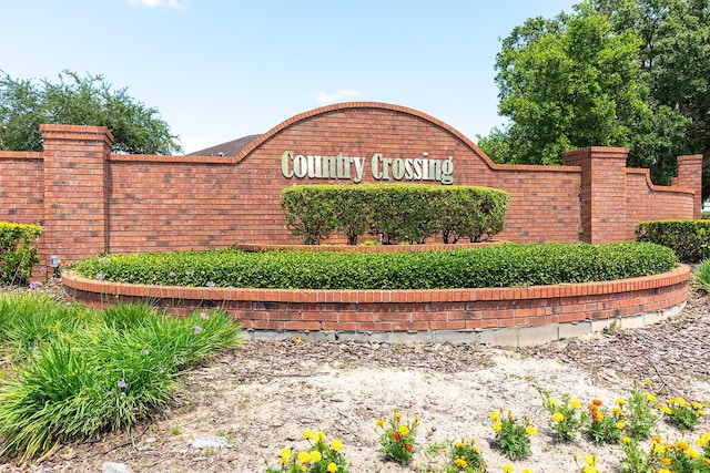 view of community sign