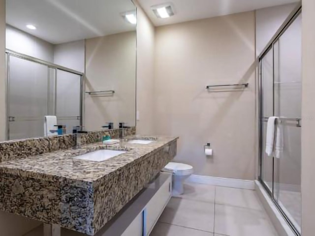 full bathroom featuring a sink and a stall shower
