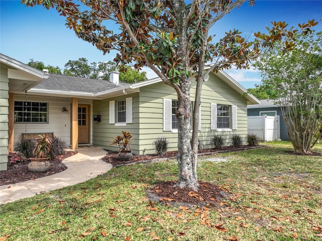 236 N Ranger Blvd, Winter Park, FL 32792 - ranch-style house featuring a chimney