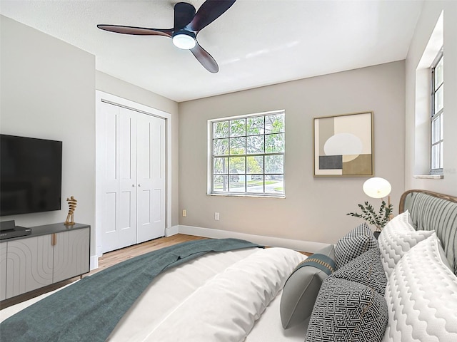 236 N Ranger Blvd, Winter Park, FL 32792 - bedroom with wood finished floors, a closet, and a ceiling fan