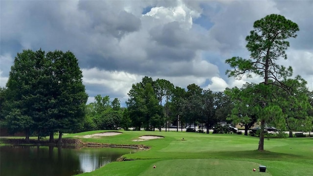 236 N Ranger Blvd, Winter Park, FL 32792 - view of community with view of wooded area, a water view, view of golf course, and a yard