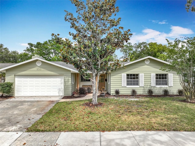 236 N Ranger Blvd, Winter Park, FL 32792 - ranch-style house featuring a front yard and driveway