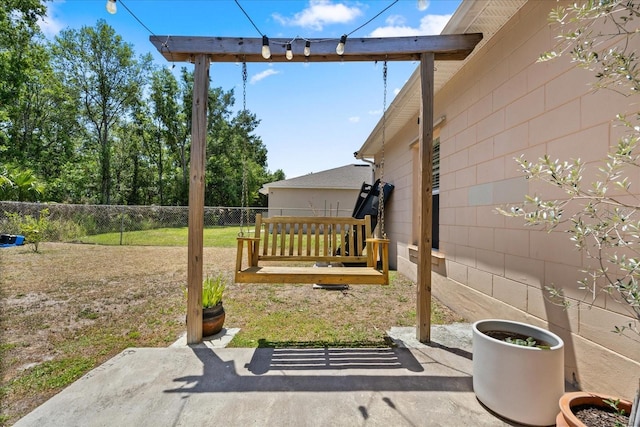 view of patio with fence
