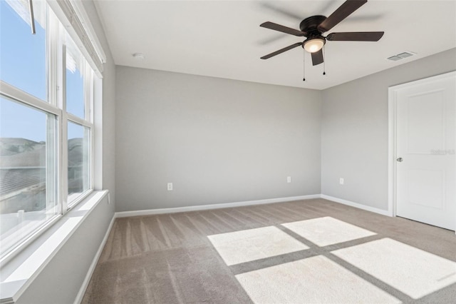 6013 Blue Lily Way, Winter Garden, FL 34787 - spare room featuring carpet flooring and a ceiling fan