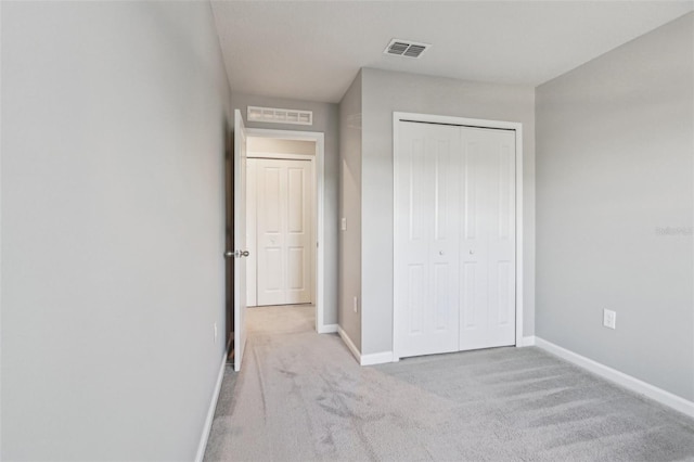 6013 Blue Lily Way, Winter Garden, FL 34787 - unfurnished bedroom with carpet flooring and a closet