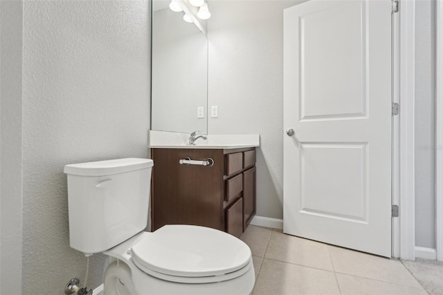 6013 Blue Lily Way, Winter Garden, FL 34787 - half bath featuring vanity, tile patterned floors, and a textured wall