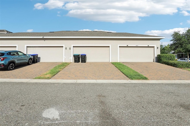 6013 Blue Lily Way, Winter Garden, FL 34787 - view of front facade featuring decorative driveway and stucco siding